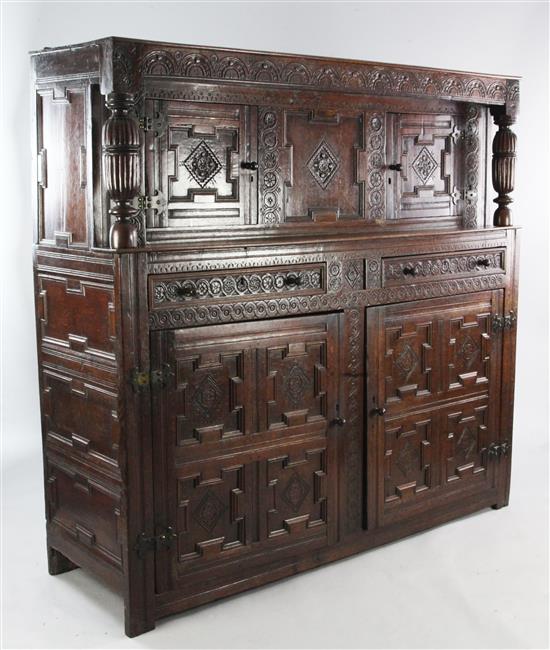 A 17th century and later carved oak court cupboard, W.5ft 8.5in.
